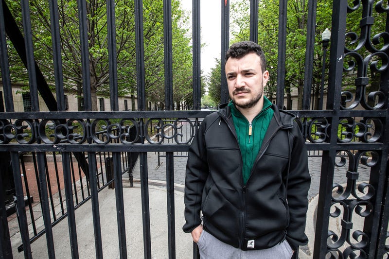 Mahmoud Khalil stands outside Columbia University in April 2024