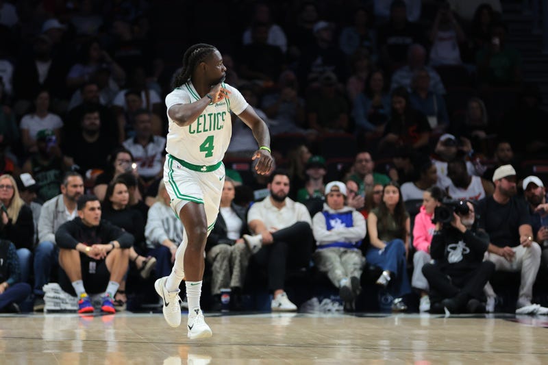 Boston Celtics guard Jrue Holiday (4) reacts after scoring against the Miami Heat during the first quarter at Kaseya Center.