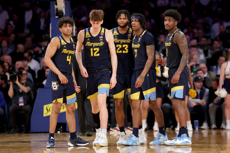 Mar 14, 2025; New York, NY, USA; Marquette Golden Eagles guard Stevie Mitchell (4) and forwards Ben Gold (12) and David Joplin (23) and guards Zaide Lowery (7) and Kam Jones (1) walk onto the court after a time out during the second half against the St. John's Red Storm at Madison Square Garden. Mandatory Credit: Brad Penner-Imagn Images