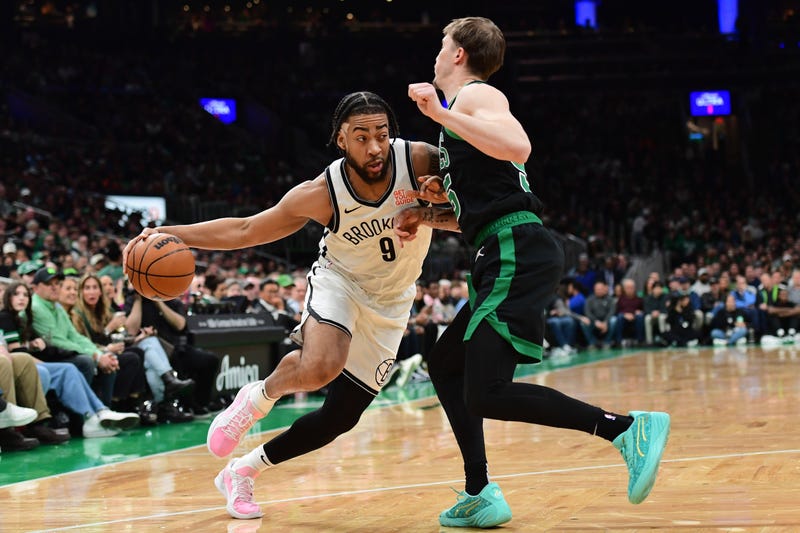 Brooklyn Nets forward Trendon Watford (9) controls the ball while Boston Celtics forward Baylor Scheierman (55) defends during the first half at TD Garden.