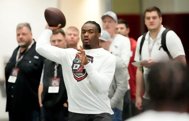 Mar 19, 2025; Tuscaloosa AL, USA; Quarterback Jalen Milroe throws for scouts at the University of Alabama Pro Day as several Crimson Tide players worked out for NFL teams in the Hank Crisp Indoor Practice Facility.