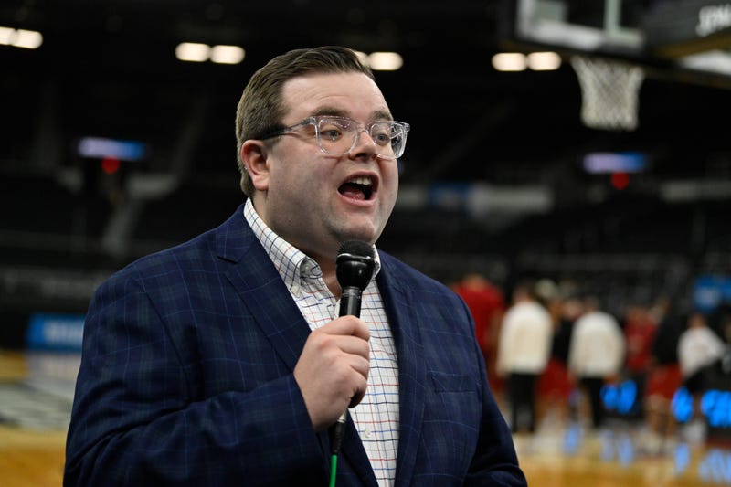 Mar 19, 2025; Providence, RI, USA; FOX and NBC Sports reporter and co-host of The Field of 68 podcast John Fanta broadcasts from the Amica Mutual Pavilion. 