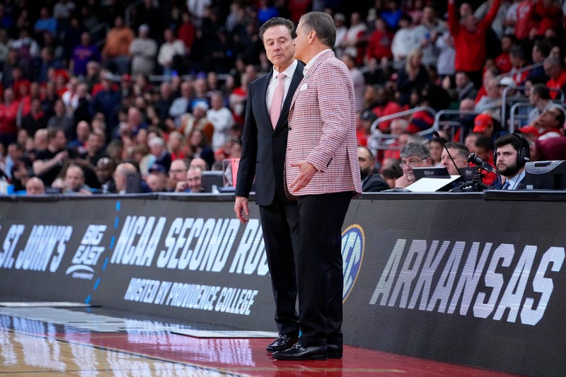 Providence, RI, USA; St. John's Red Storm head coach Rick Pitino and Arkansas Razorbacks head coach John Calipari shake hands as the Razorbacks won a second round men’s NCAA Tournament game at Amica Mutual Pavilion.