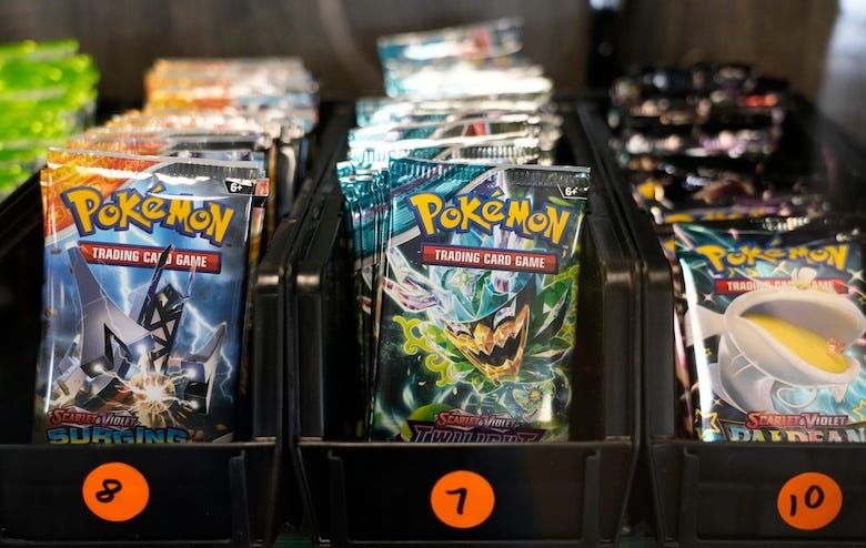 Packs of Pokémon cards on display