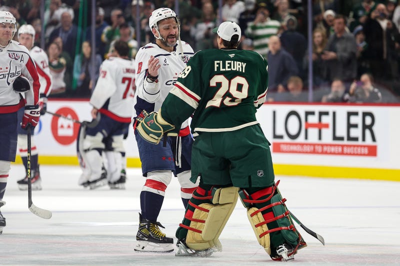 Alexander Ovechkin and Marc-Andre Fleury embracing