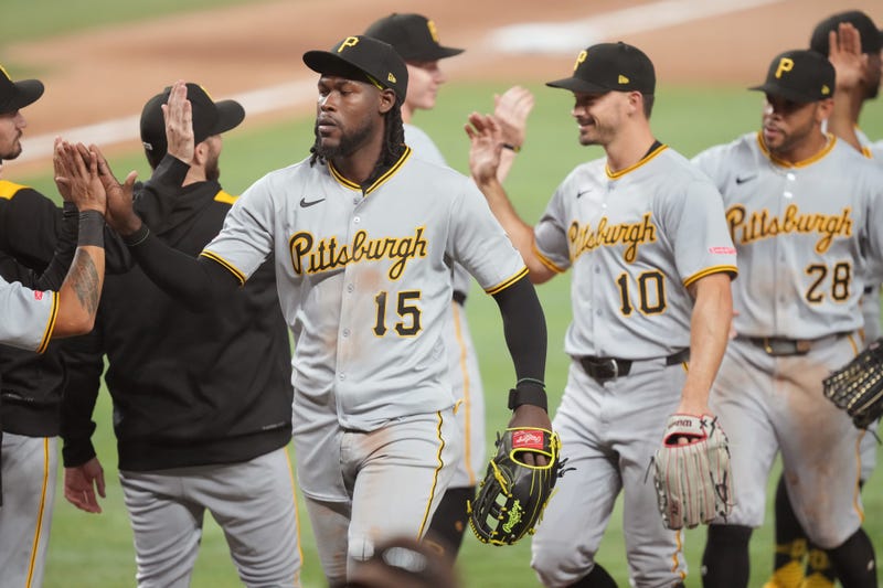 Oneil Cruz & others celebrating in line after game