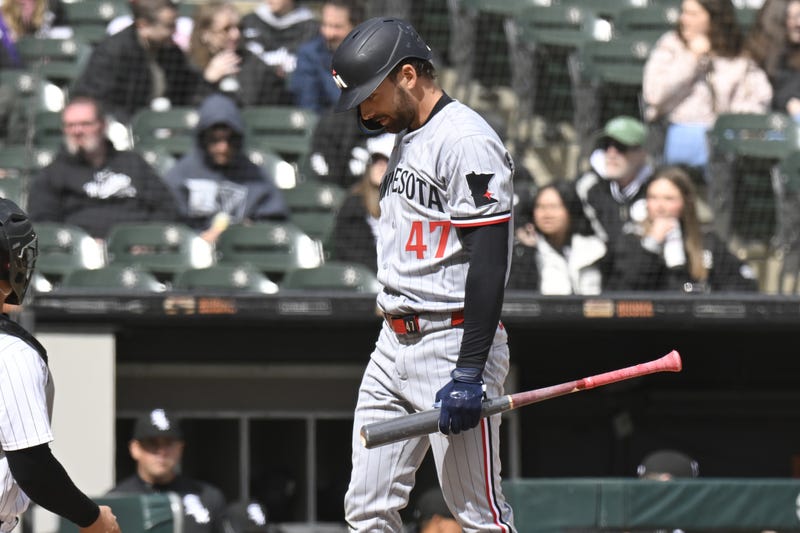 Minnesota Twins second base Edouard Julien (47) after striking out swinging against the Chicago White Sox during the sixth inning at Guaranteed Rate Field.