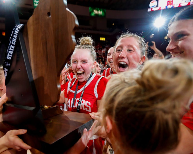 Kimberly High School's Ava Van Vonderen (left) and Haylie Dulas (right) celebrate with the state championship trophy after defeating against Muskego High School in the WIAA Division 1 state championship game on Saturday, March 15, 2025, at the Resch Center in Ashwaubenon, Wis. Kimberly won the game, 47-26. Tork Mason/USA TODAY NETWORK-Wisconsin