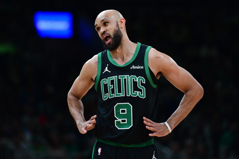 Boston Celtics guard Derrick White (9) has words with the official during the first half against the Miami Heat at TD Garden.