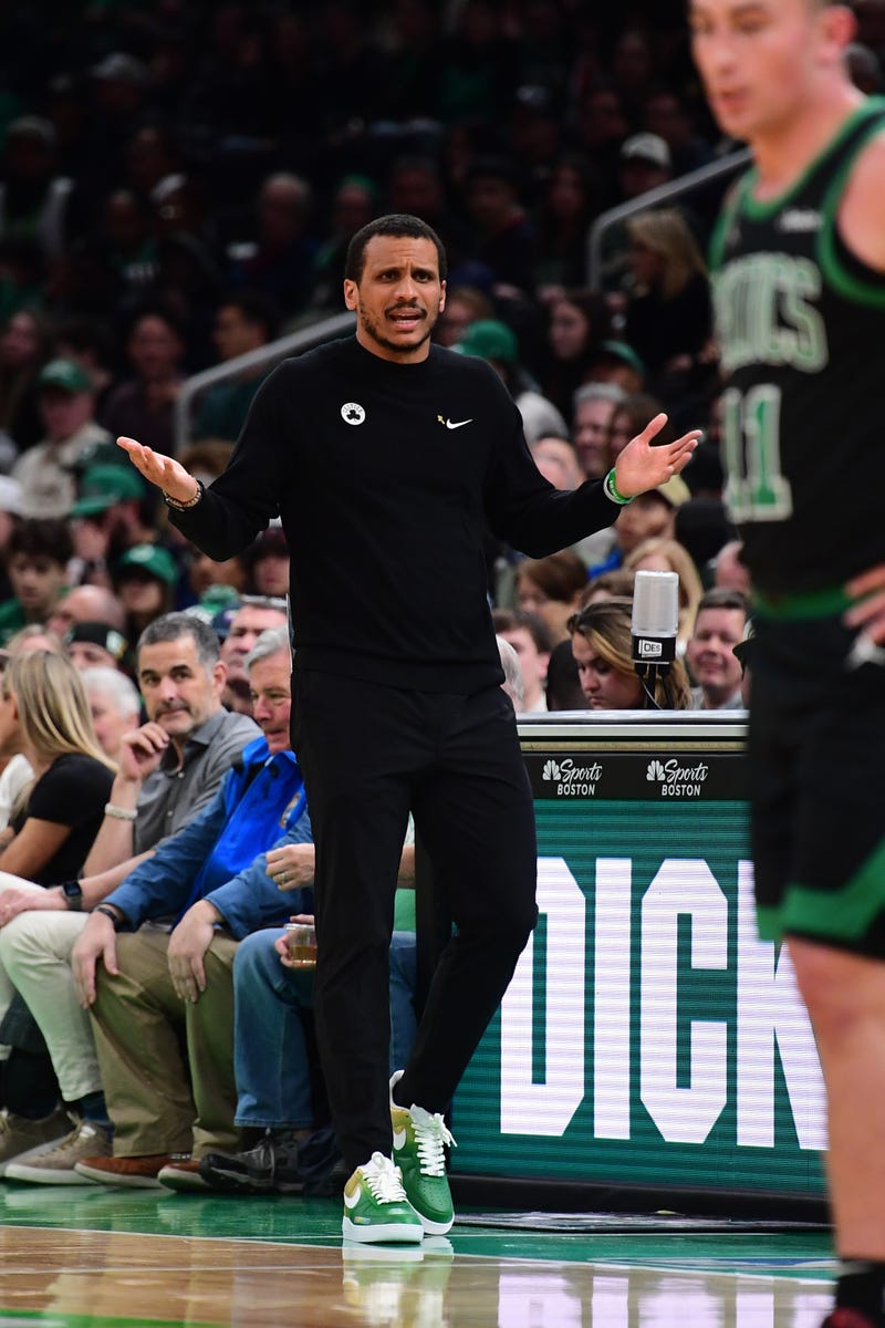 Boston Celtics head coach Joe Mazzulla reacts after a play during the first half against the Miami Heat at TD Garden.