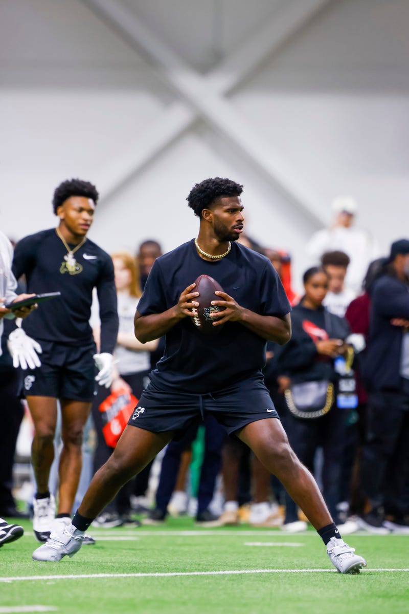 Apr 4, 2025; Boulder, CO, USA; Colorado Buffaloes quarterback Shedeur Sanders (2) passes the ball at the University of Colorado NFL Showcase at the CU Indoor Practice Facility. 