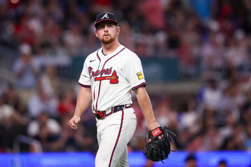 Atlanta Braves starting pitcher Spencer Schwellenbach (56) walks off the field against the Miami Marlins in the eighth inning at Truist Park.