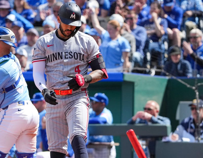 Minnesota Twins shortstop Carlos Correa (4) reacts after striking out against the Kansas City Royals in the sixth inning at Kauffman Stadium.