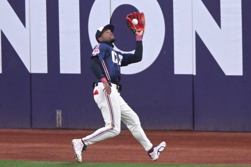 Cleveland Guardians center fielder Angel Martinez (1) makes a running catch in the fifth inning against the Kansas City Royals at Progressive Field