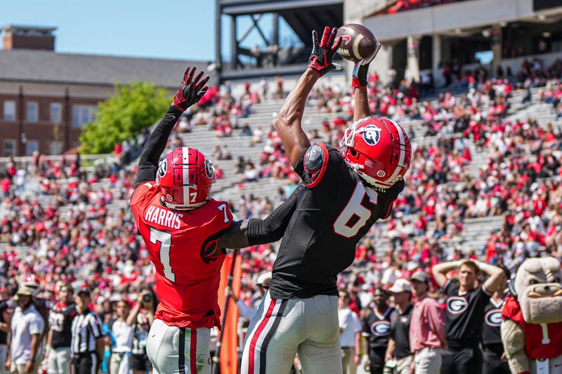 Apr 12, 2025; Athens, GA, USA; Georgia Bulldogs wide receiver CJ Wiley (6) tries to make a catch behind defensive back Daniel Harris (7) during the Georgia Spring game at Sanford Stadium. Mandatory Credit: Dale Zanine-Imagn Images
