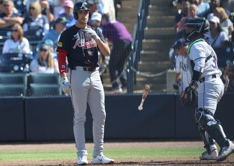 Atlanta Braves first base Matt Olson (28) tosses his bat after he struck out during the first inning against the Tampa Bay Rays at George M. Steinbrenner Field.