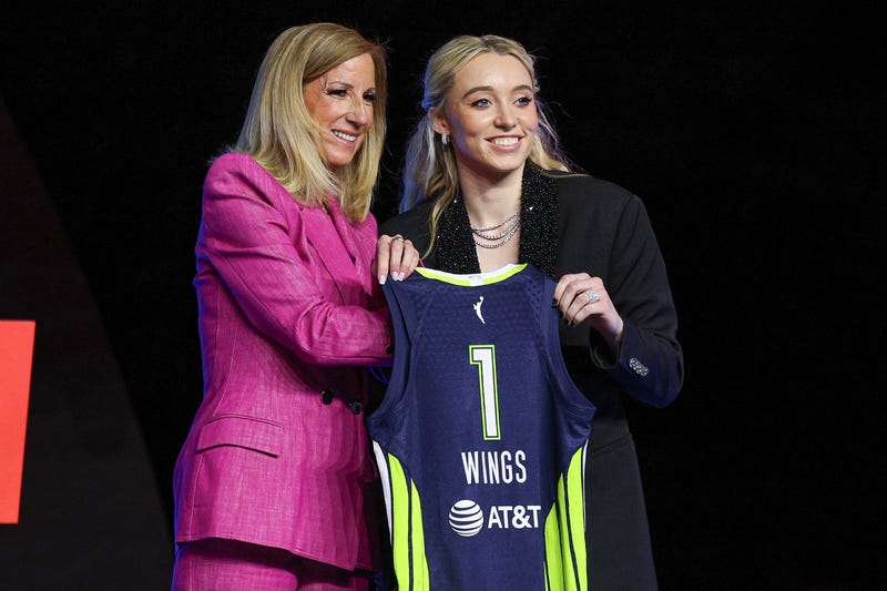 Paige Bueckers poses with WNBA commissioner Cathy Engelbert after being selected with the number one overall pick to the Dallas Wings in the 2025 WNBA Draft at The Shed at Hudson Yards.