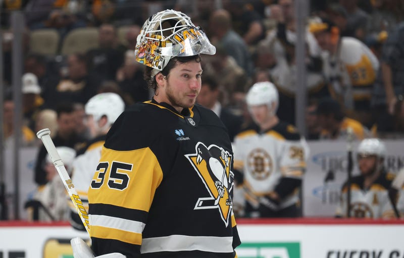 Tristan Jarry looking on ice