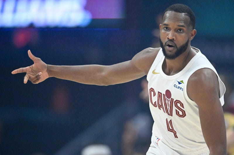 Apr 20, 2025; Cleveland, Ohio, USA; Cleveland Cavaliers forward Evan Mobley (4) celebrates his three-point basket in the first quarter against the Miami Heat at Rocket Arena.