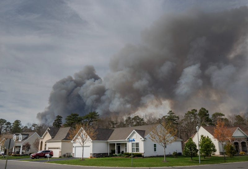 A forest fire at the border of Barnegat/Waretown, as seen from Heritage Place homes in Barnegat looking north