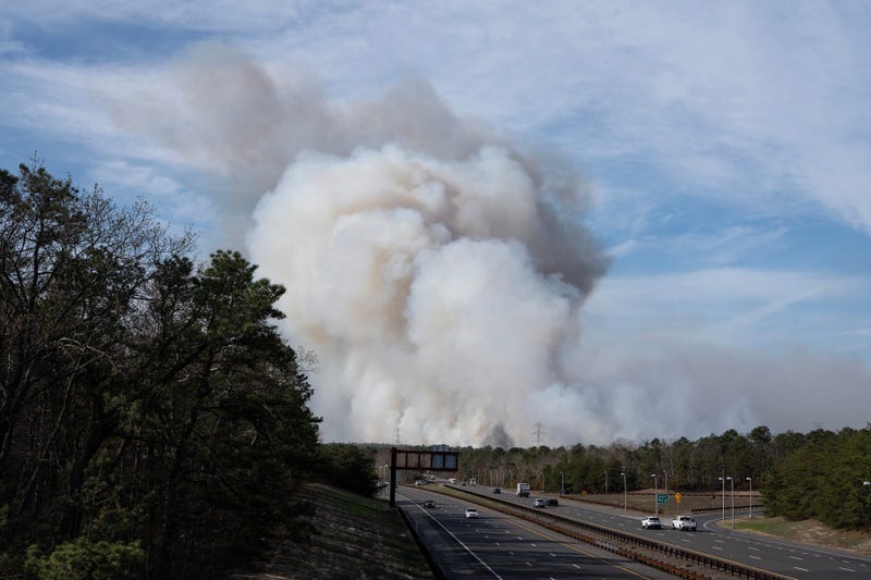 View looking south down the Garden State Parkway of the Jones Road Fire burning in Ocean County. Forked River, NJ Wednesday, April 24, 2025