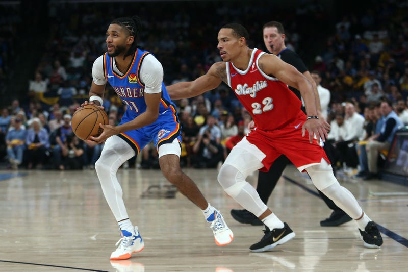 Oklahoma City Thunder guard Isaiah Joe (11) drives to the basket as Memphis Grizzlies guard Desmond Bane (22) defends during the fourth quarter during game four for the first round of the 2024 NBA Playoffs at FedExForum.
