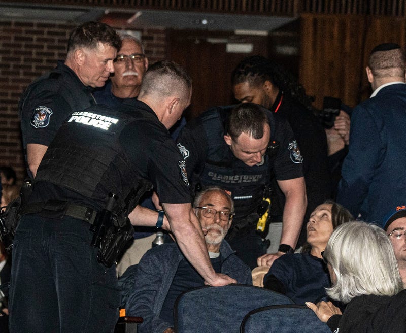 Clarkstown police remove an attendee during a town hall event held by U.S. Rep. Mike Lawler at Clarkstown South High School in West Nyack April 27, 2025
