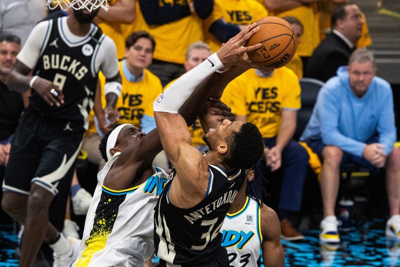 Apr 29, 2025; Indianapolis, Indiana, USA; Milwaukee Bucks forward Giannis Antetokounmpo (34) shoots the ball while Indiana Pacers forward Pascal Siakam (43) defends during game five of the first round for the 2024 NBA Playoffs at Gainbridge Fieldhouse. Mandatory Credit: Trevor Ruszkowski-Imagn Images