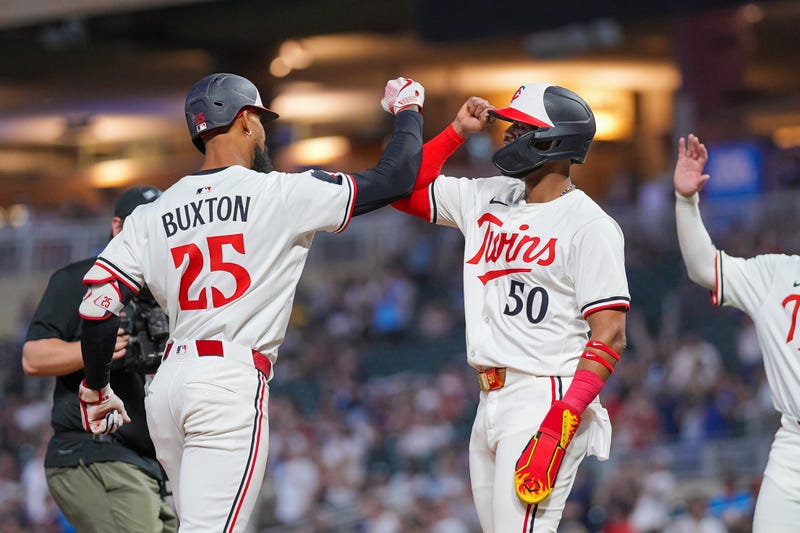 Minnesota Twins outfielder Byron Buxton (25) celebrates his home run with outfielder Willi Castro (50) against the Baltimore Orioles in the seventh inning at Target Field.
