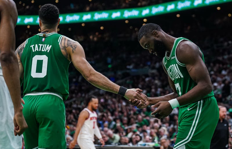 Boston Celtics guard Jaylen Brown (7) reacts after missing a pass from Boston Celtics forward Jayson Tatum (0) against the New York Knicks in the second half during game two of the second round for the 2025 NBA Playoffs at TD Garden.