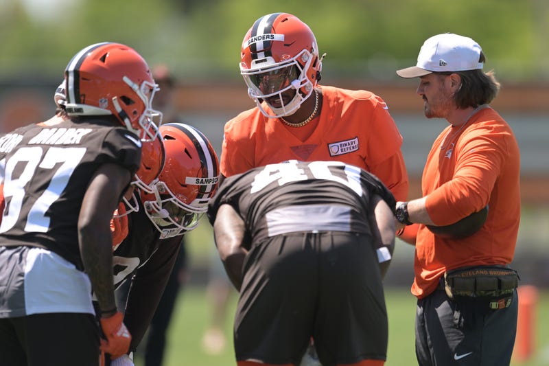 Cleveland Browns quarterback Shedeur Sanders (12) calls a play during rookie minicamp at CrossCountry Mortgage Campus. 