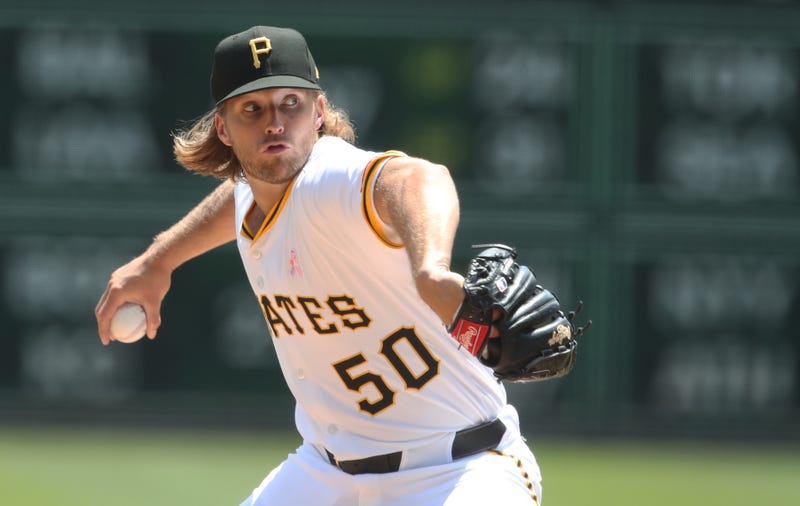 Carmen Mlodzinski pitching against Braves