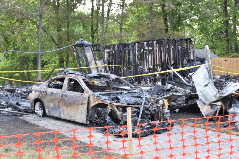 An early-morning blast killed two people, destroyed a home and damaged adjacent houses on Tranquility Court in the Sewell section of Washington Township on May 11, 2025
