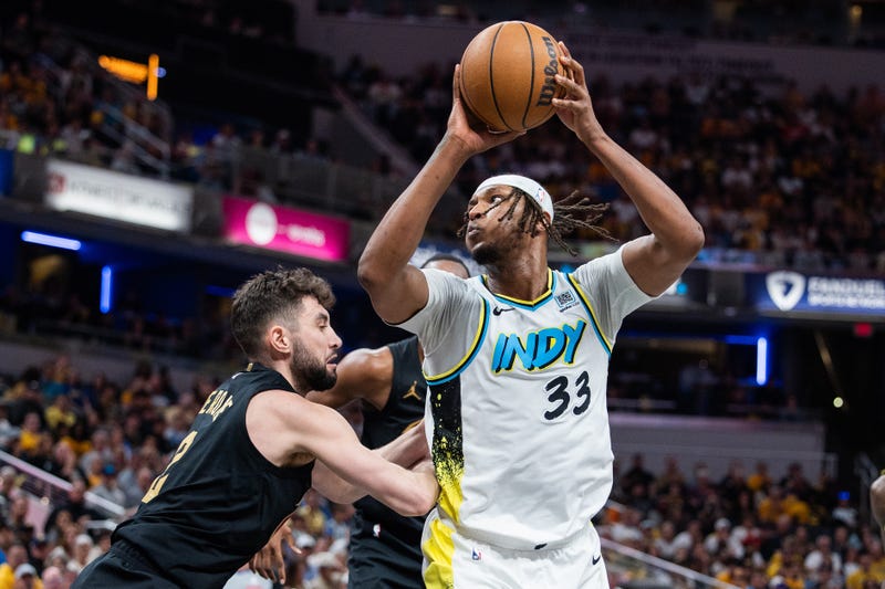 May 11, 2025; Indianapolis, Indiana, USA; Indiana Pacers center Myles Turner (33) shoots the ball while Cleveland Cavaliers guard Ty Jerome (2) defends during game four of the second round for the 2025 NBA Playoffs at Gainbridge Fieldhouse. Mandatory Credit: Trevor Ruszkowski-Imagn Images