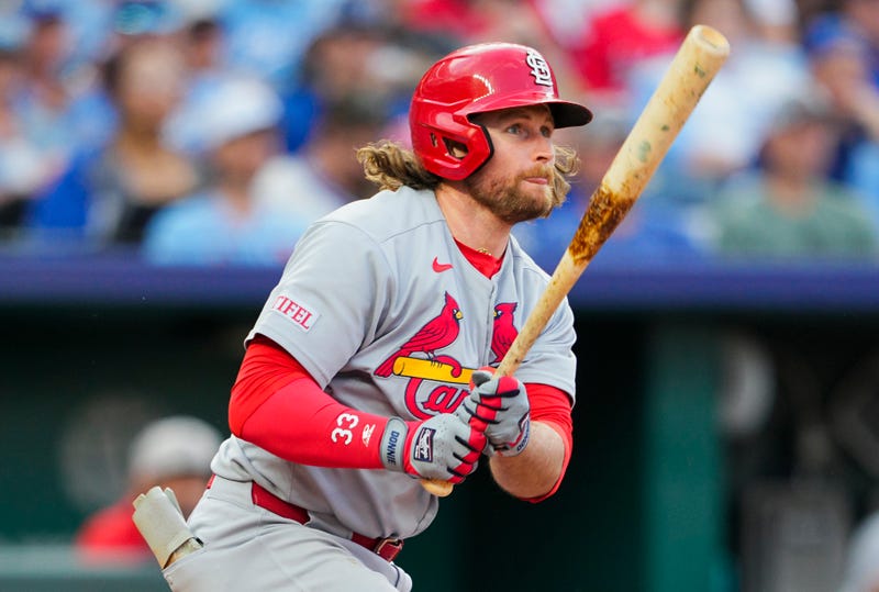 St. Louis Cardinals second baseman Brendan Donovan (33) hits a double during the fourth inning against the Kansas City Royals at Kauffman Stadium.
