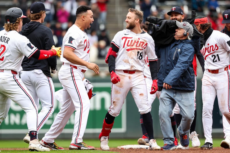 Minnesota Twins second baseman Kody Clemens (18) celebrates his walk off double against the Cleveland Guardians in the ninth inning during game one of a doubleheader at Target Field.