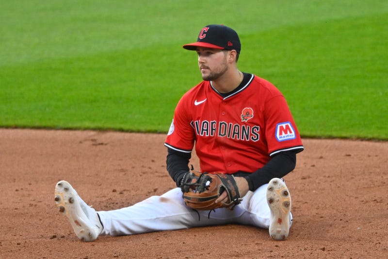 May 26, 2025; Cleveland, Ohio, USA; Cleveland Guardians second baseman Will Wilson (7) sits on the infield in the sixth inning against the Los Angeles Dodgers at Progressive Field.