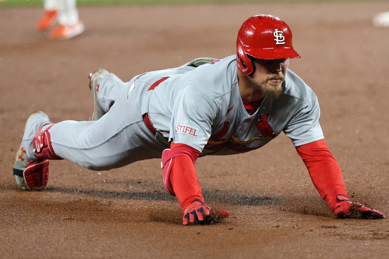 St. Louis Cardinals second baseman Nolan Gorman (16) slides safely into third after hitting a triple during the eighth inning against the Baltimore Orioles at Oriole Park at Camden Yards.