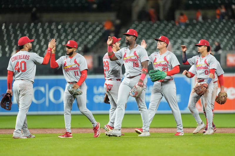 The St. Louis Cardinals celebrate the victory against the Baltimore Orioles after the ninth inning at Oriole Park at Camden Yards.