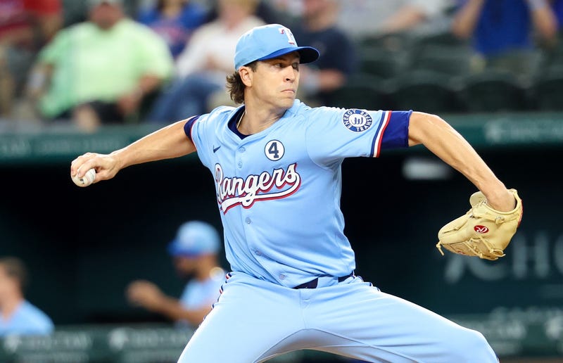 Texas Rangers starting pitcher Jacob deGrom (48) throws during the first inning against the St. Louis Cardinals at Globe Life Field.