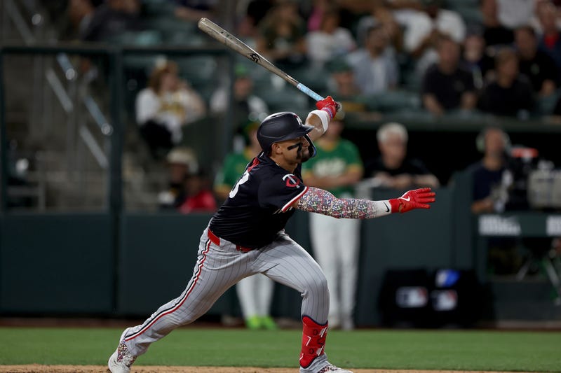 Minnesota Twins third baseman Royce Lewis (23) hits a two run RBI double against the Athletics at Sutter Health Park.