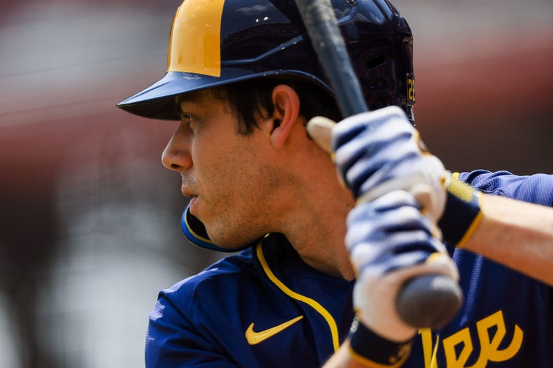 Jun 4, 2025; Cincinnati, Ohio, USA; Milwaukee Brewers designated hitter Christian Yelich (22) prepares on deck in the seventh inning against the Cincinnati Reds at Great American Ball Park. Mandatory Credit: Katie Stratman-Imagn Images