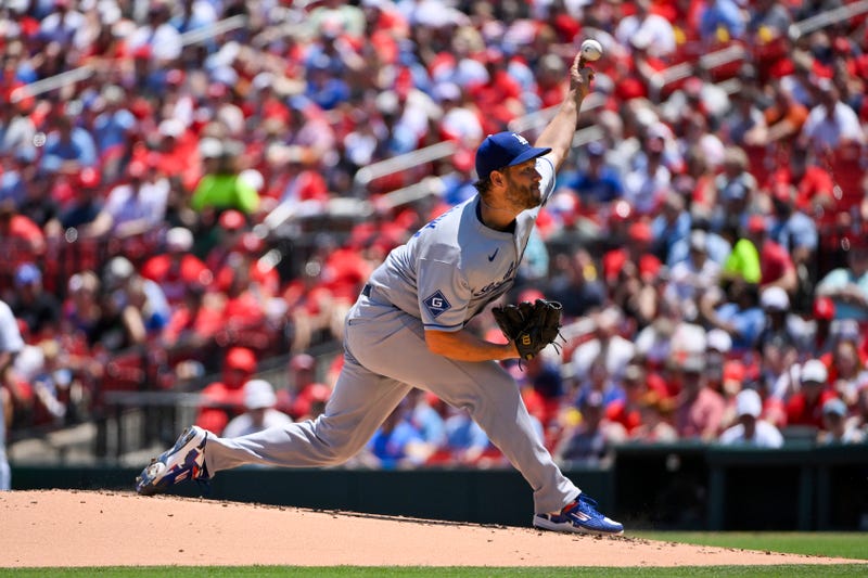 Los Angeles Dodgers starting pitcher Clayton Kershaw (22) pitches against the St. Louis Cardinals during the first inning at Busch Stadium.