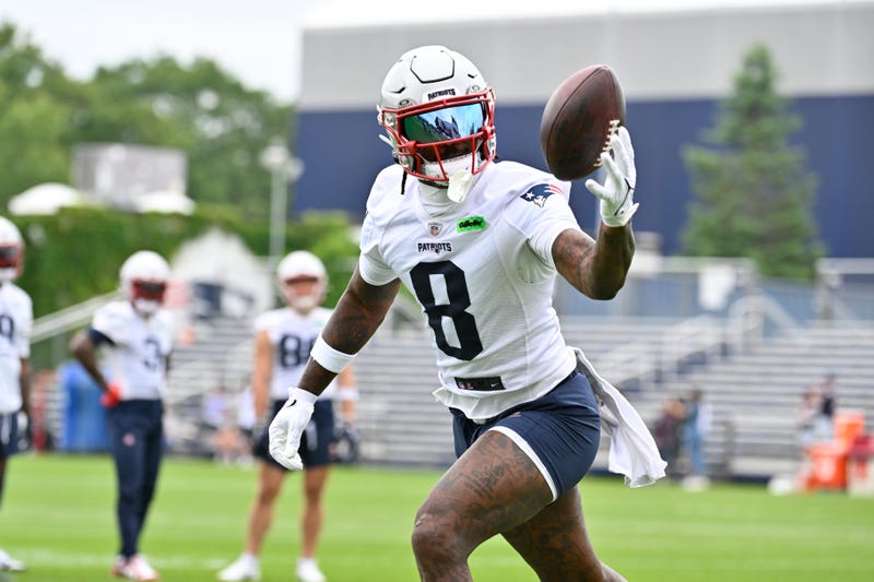 New England Patriots wide receiver Stefon Diggs (8) tries to catch the ball during minicamp at Gillette Stadium.