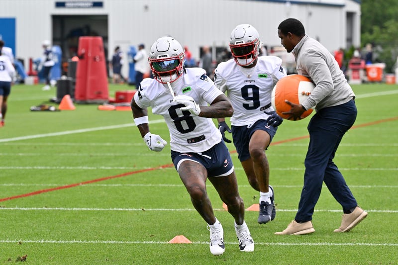 New England Patriots wide receiver Stefon Diggs (8) and wide receiver Kayshon Boutte (9) runs through a drill during minicamp at Gillette Stadium.