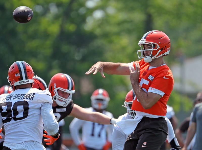 Cleveland Browns quarterback Joe Flacco (15) throws over defensive end Joe Tryon-Shoyinka (90) during practice at NFL minicamp, Wednesday, June 11, 2025, in Berea, Ohio.