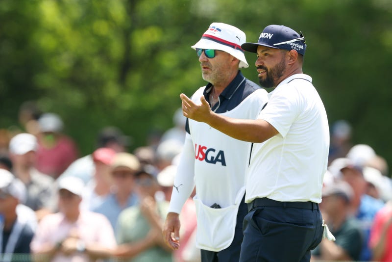 JJ Spaun and his caddy