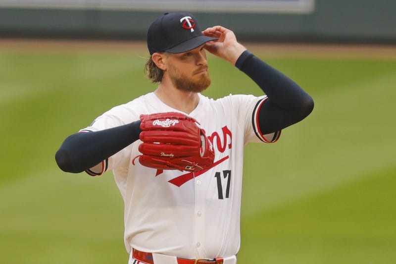 Minnesota Twins starting pitcher Bailey Ober (17) awaits the manager to get pulled from throwing to the Texas Rangers in the fifth inning at Target Field.