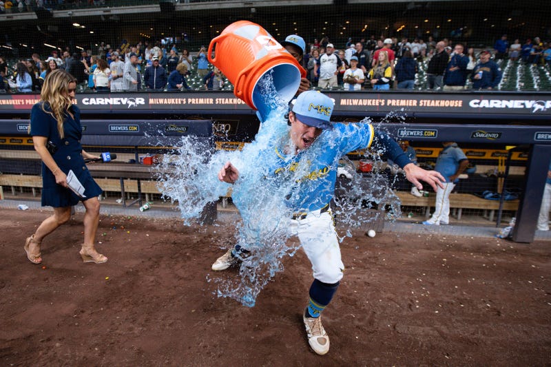 Milwaukee Brewers right fielder Sal Frelick (10) is dunked with Gatorade following the game against the St. Louis Cardinals at American Family Field.