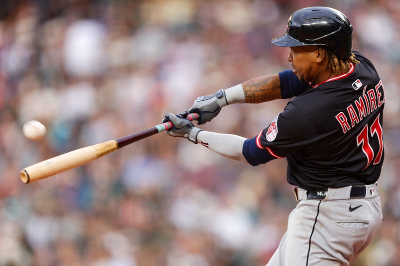 Cleveland Guardians third baseman José Ramírez (11) hits a home run during the fifth inning against the Seattle Mariners at T-Mobile Park.